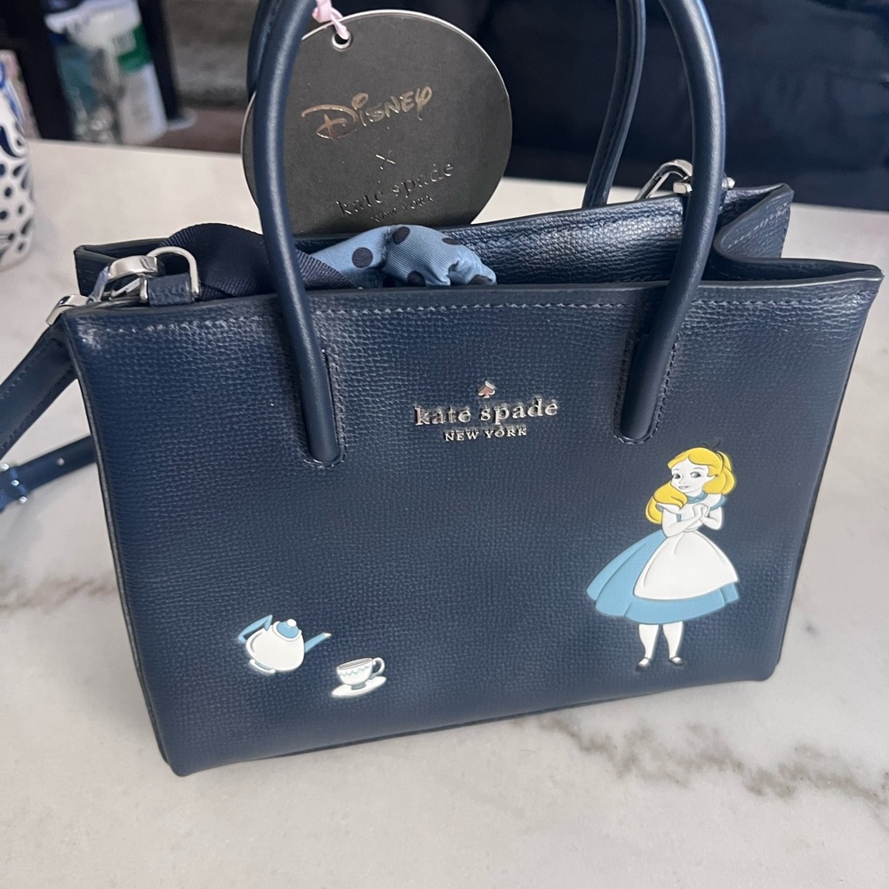 Kate Spade- Alice in wonderland shopper crossbody.